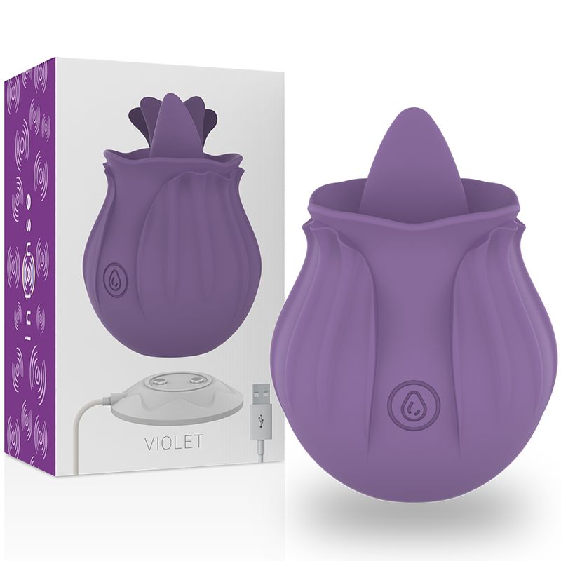 Verpackung mit lila Stimulator, Ladestation und USB-Kabel. Produkt in Blütenform. Text: VIOLET.