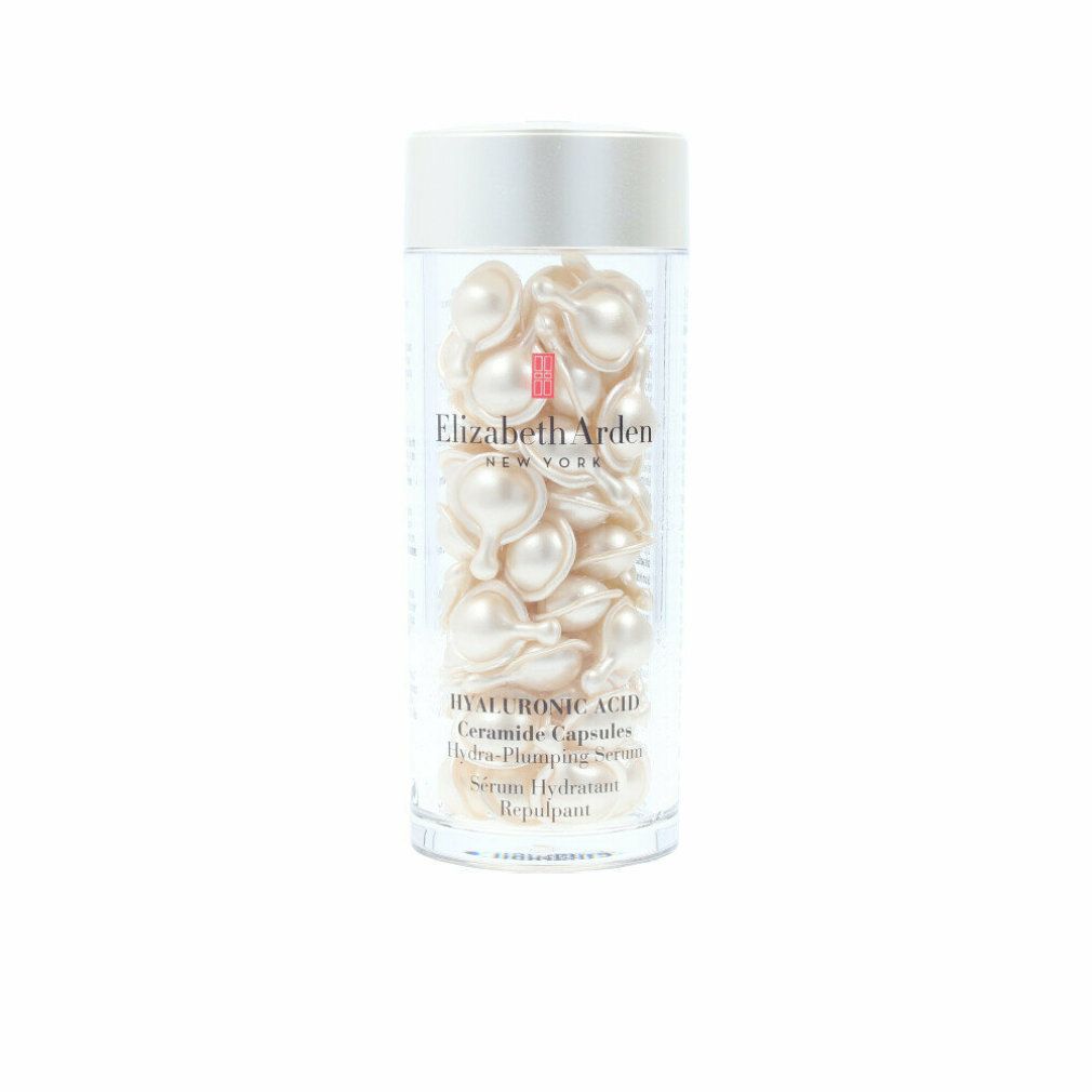 Flasche mit Kapseln. Aufschrift: Elizabeth Arden New York. Produktname und Inhaltsstoffe.