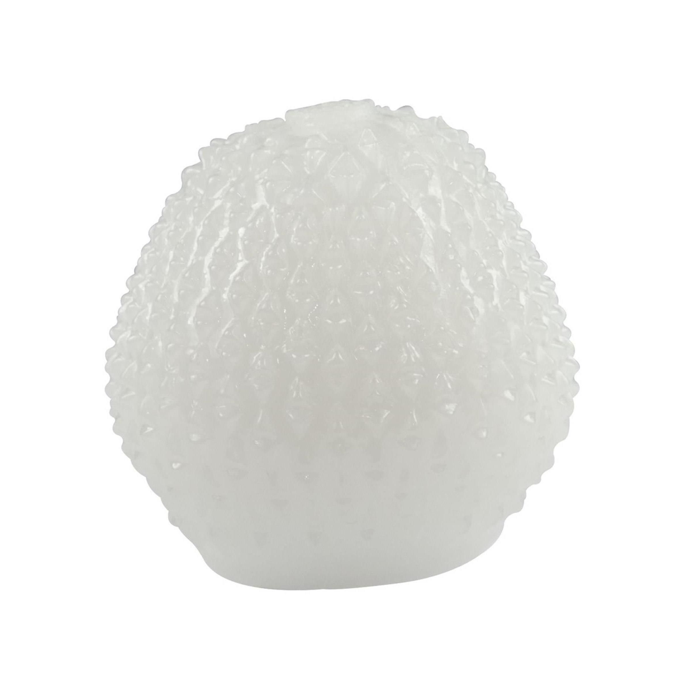 Weißes, eiförmiges Produkt mit strukturierter Oberfläche.