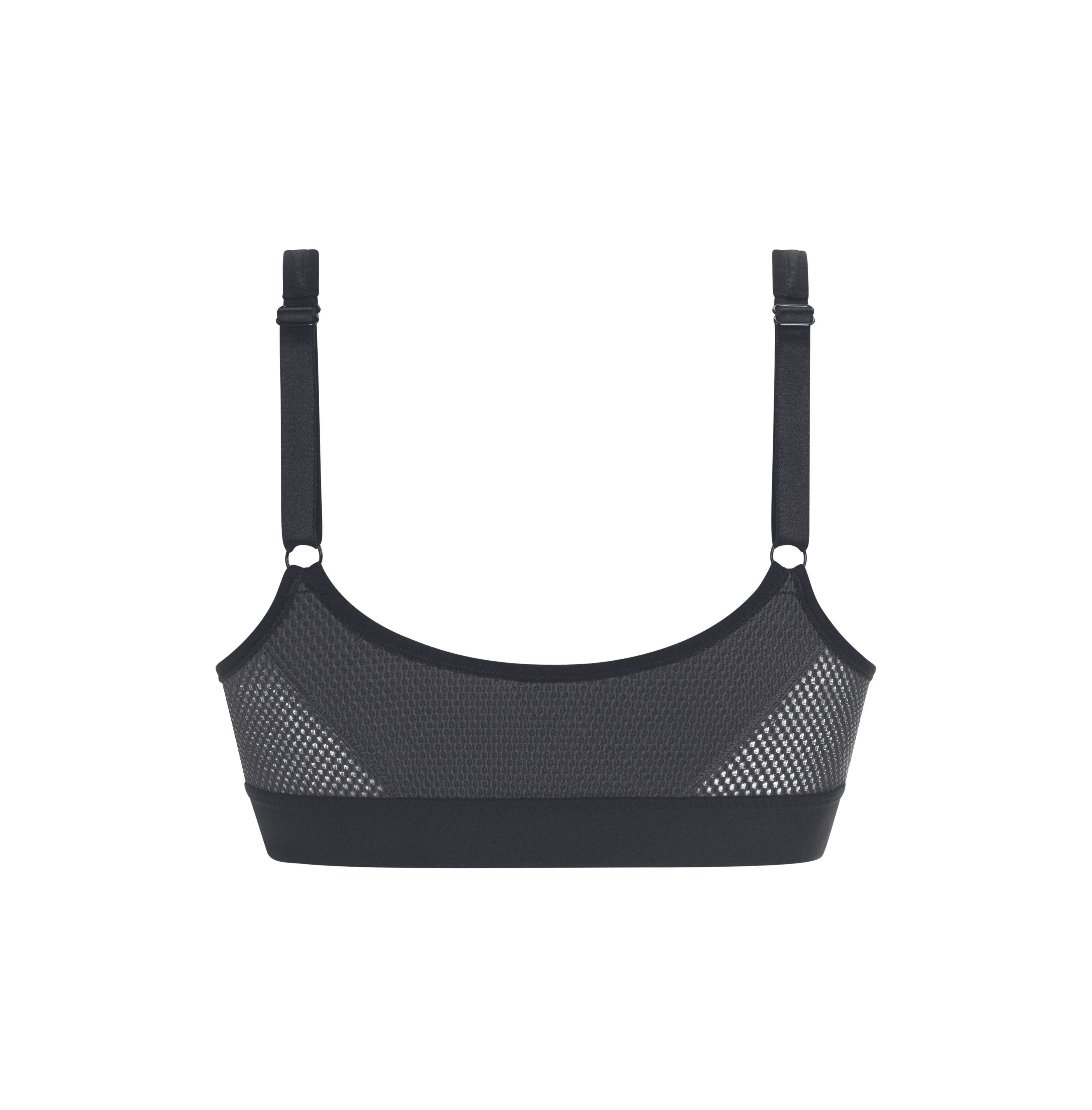 Schwarzer BH-Rücken mit Mesh-Einsatz. Verstellbare Träger. Breites Unterbrustband. Haken für Träger.