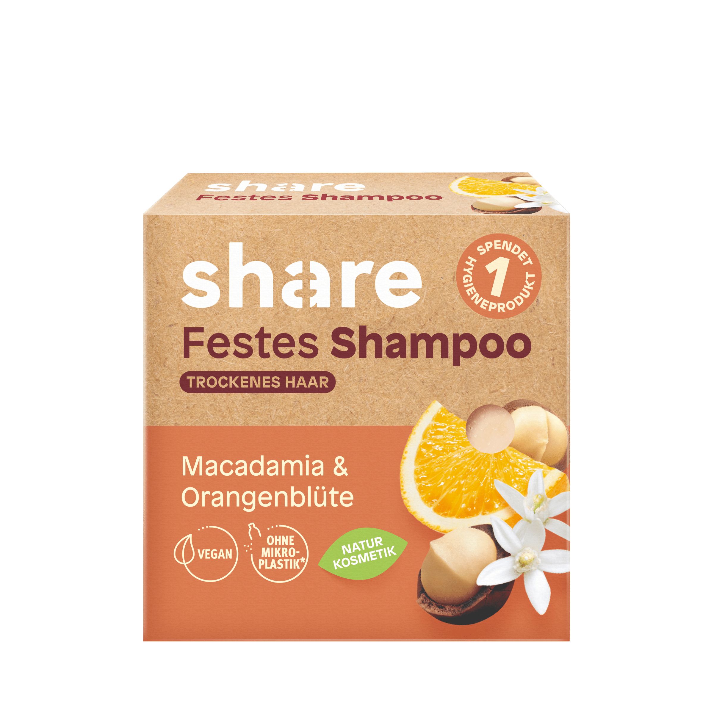 Kartonverpackung mit "share Festes Shampoo". Orangefarbenes Feld mit Macadamia, Orangenblüte und Vegan-Logo.