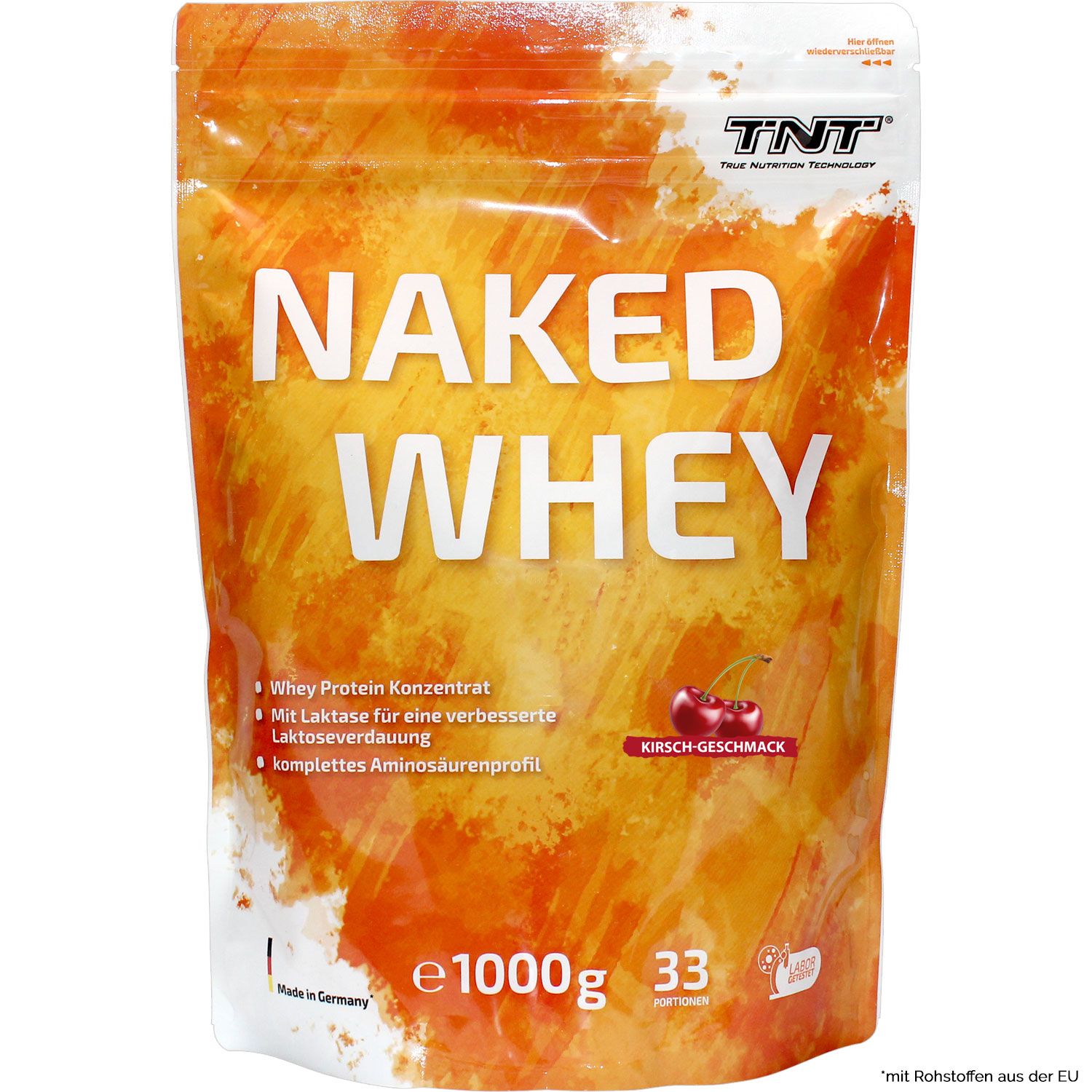 Beutel mit TNT Naked Whey. Aufschrift: NAKED WHEY, Kirsch-Geschmack, 1000g. Mit Laktase. Kirschen abgebildet.