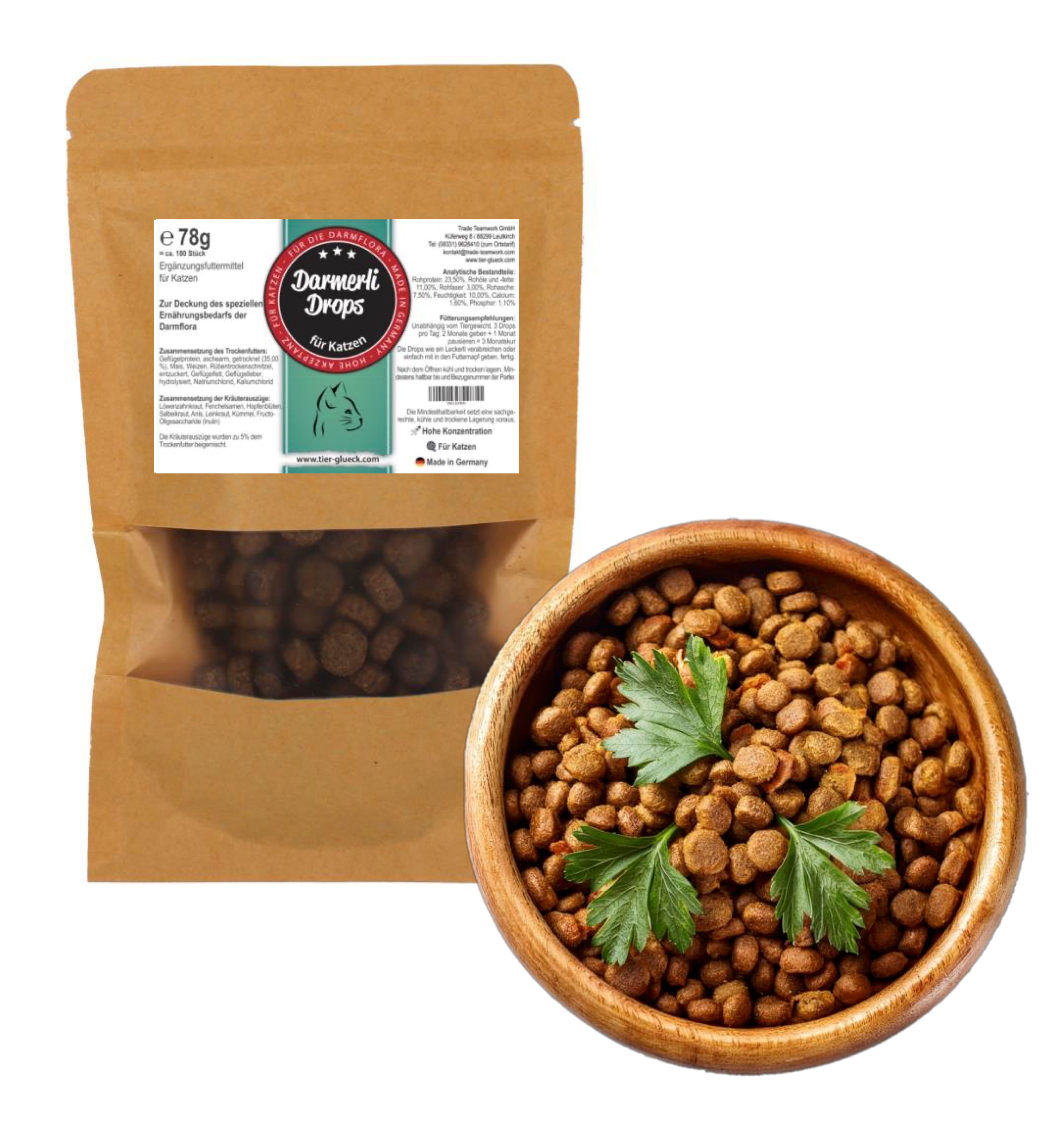Beutel und Schale mit TierGlück Darmerli Drops für Katzen. Braune Tropfen, ergänzt durch Petersilie. Holzschale.