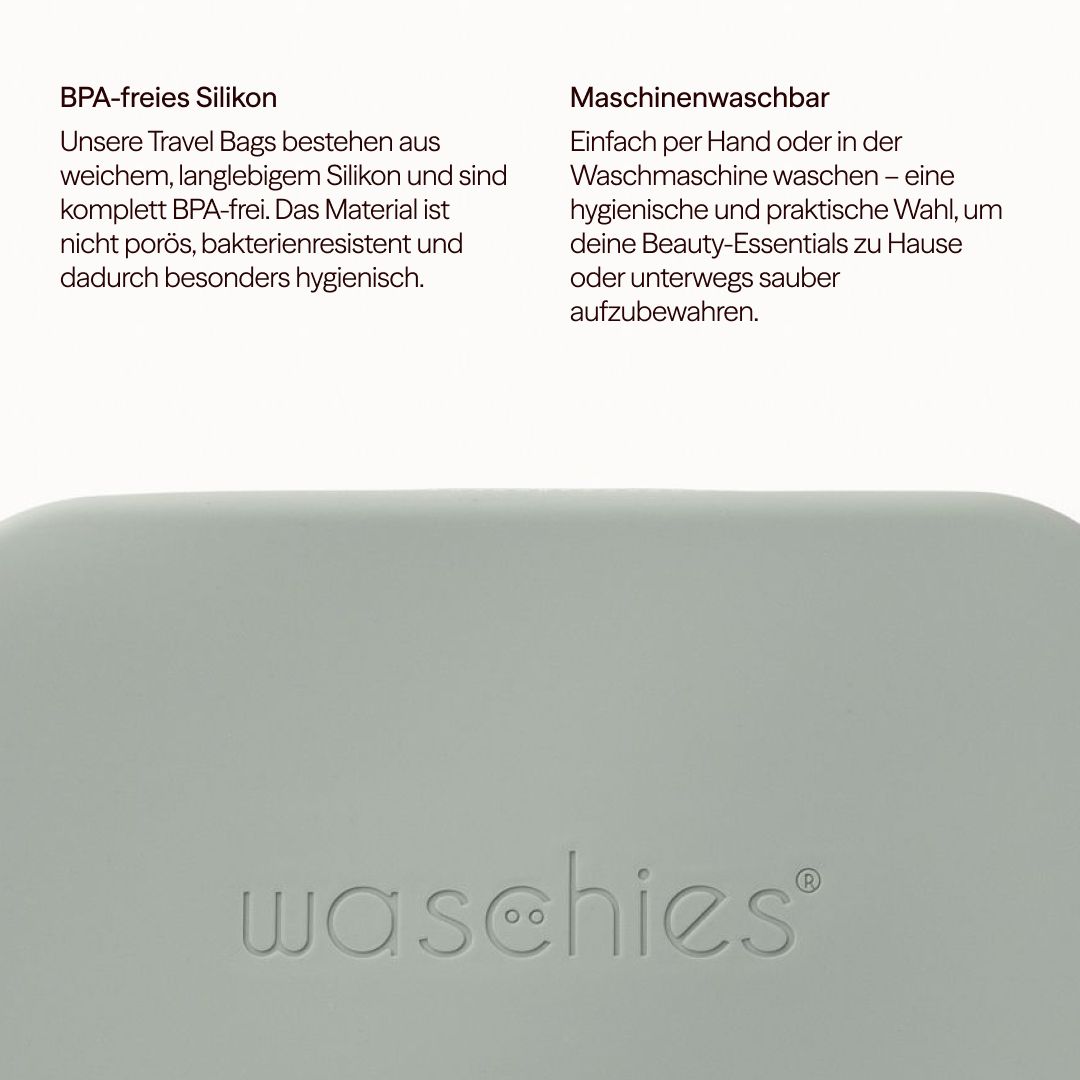 Hellgraue Beauty Bag mit geprägtem Logo. Text: BPA-freies Silikon, maschinenwaschbar. Produktbeschreibung.