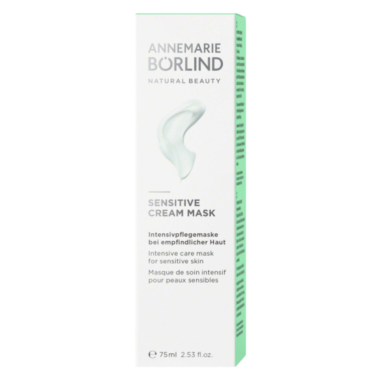 Grüne Tube mit silbernem Deckel. Aufschrift: ANNEMARIE BÖRLIND, SENSITIVE CREAM MASK. Text in Deutsch, Englisch und Französisch.