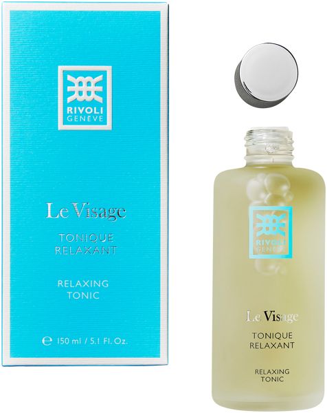 Flakon und Schachtel von Rivoli Geneve Le Visage Tonique Relaxant. Flakon mit silbernem Deckel, blaue Schachtel mit Logo und Text.