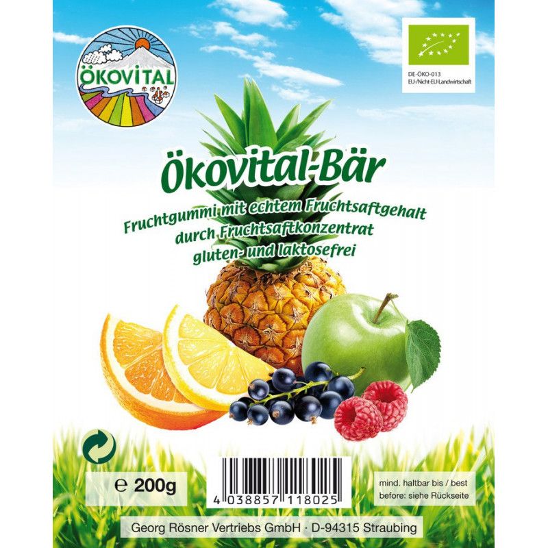 Verpackung von Ökovital-Bär. Abgebildet sind Früchte wie Ananas, Apfel, Beeren und Zitrusfrüchte. Mit Bio-Siegel und Text.