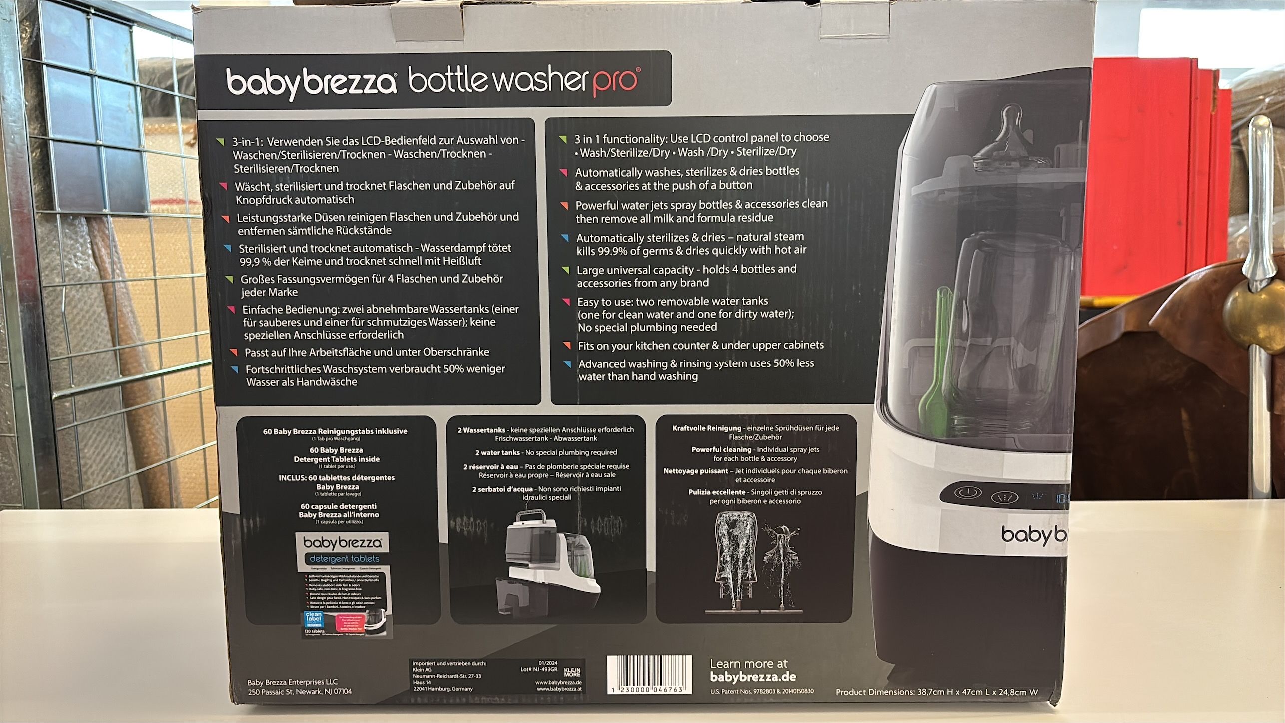 Produktverpackung, Rückseite. Text und Illustrationen. Marke: babybrezza bottle washer pro.