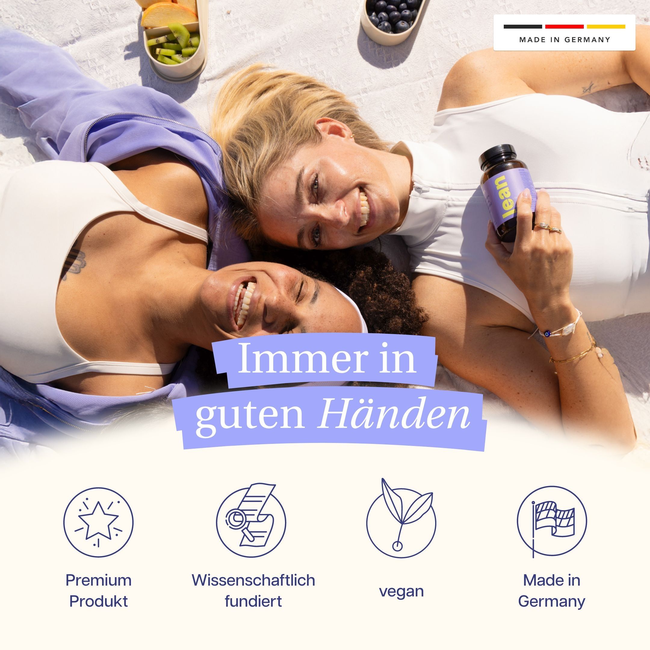 Zwei Frauen liegen, halten eine Flasche lean. Text: Immer in guten Händen. Logos: Premium, wissenschaftlich fundiert, vegan, Made in Germany.