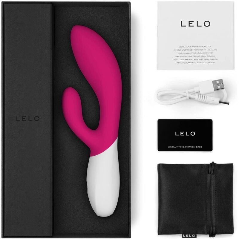 Weiß-pinkfarbener Vibrator. Gebogene Form mit zwei Ausläufern. Glatte Oberfläche.
