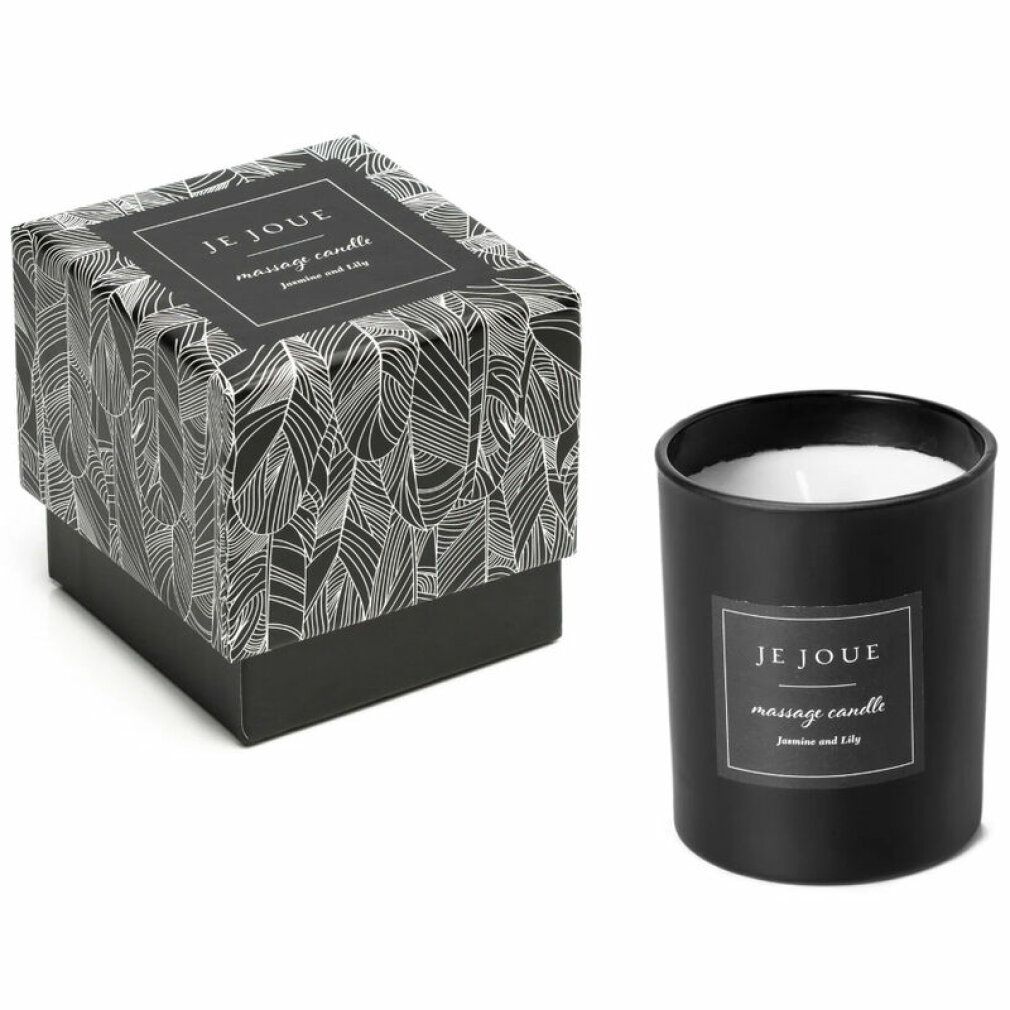 Schwarze Kerze und Verpackung. Aufschrift: JE JOUE, massage candle, Jasmine and Lily.