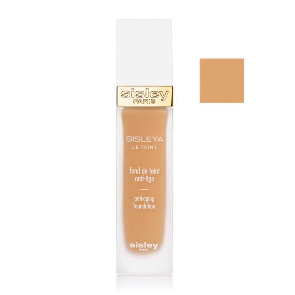 Sisley Sisleya Le Teint Foundation. Flasche mit Farbton-Quadrat. Weißer Deckel, goldene Akzente. Produkttext sichtbar.