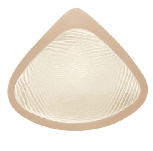 Brustprothese in voller Brustform. Beige Umrandung, transparente Innenseite mit Wellenmuster.