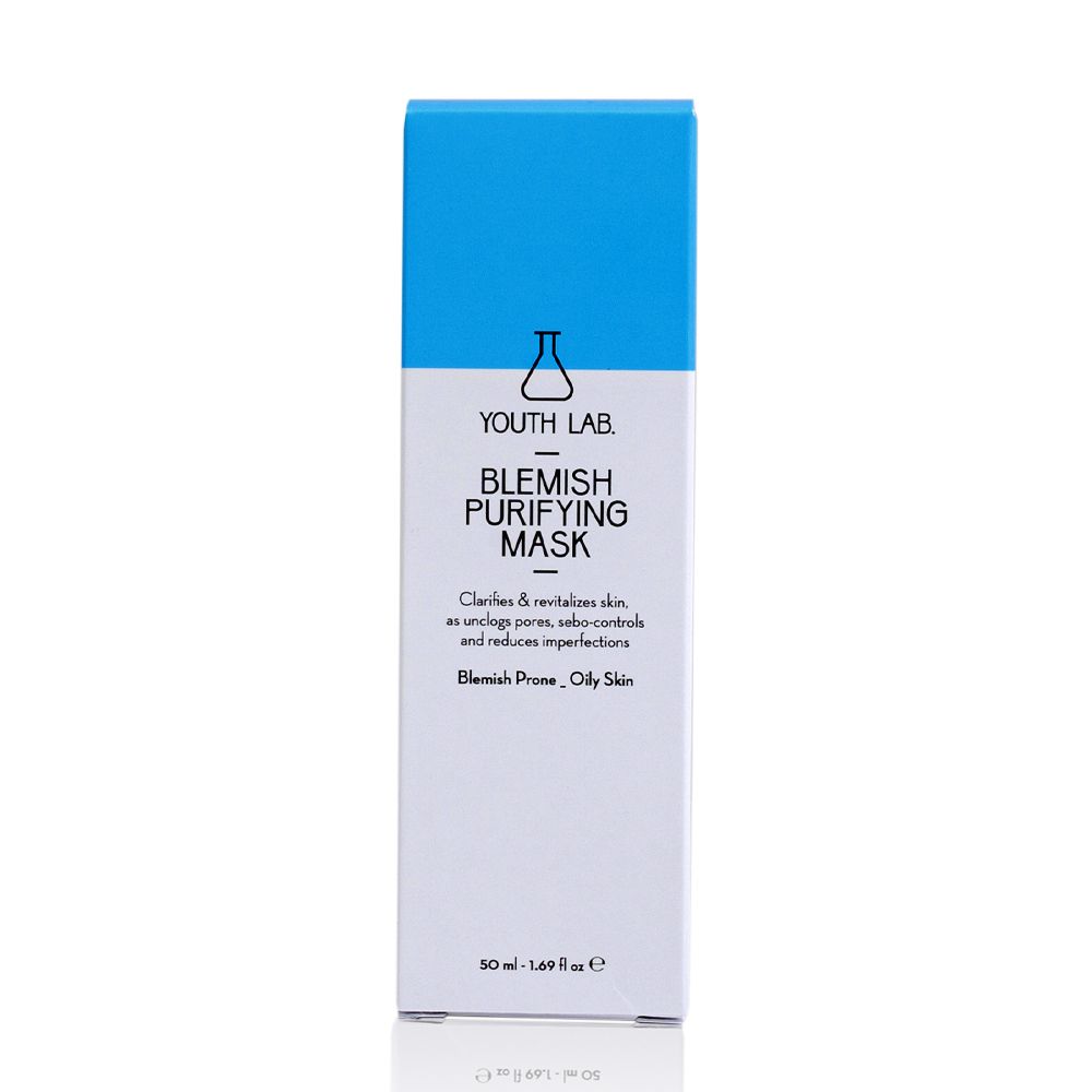 Kartonverpackung mit blauem Deckel. Aufschrift: YOUTH LAB Blemish Purifying Mask. Text: Klärt & revitalisiert die Haut, verfeinert Poren, reduziert Unreinheiten.