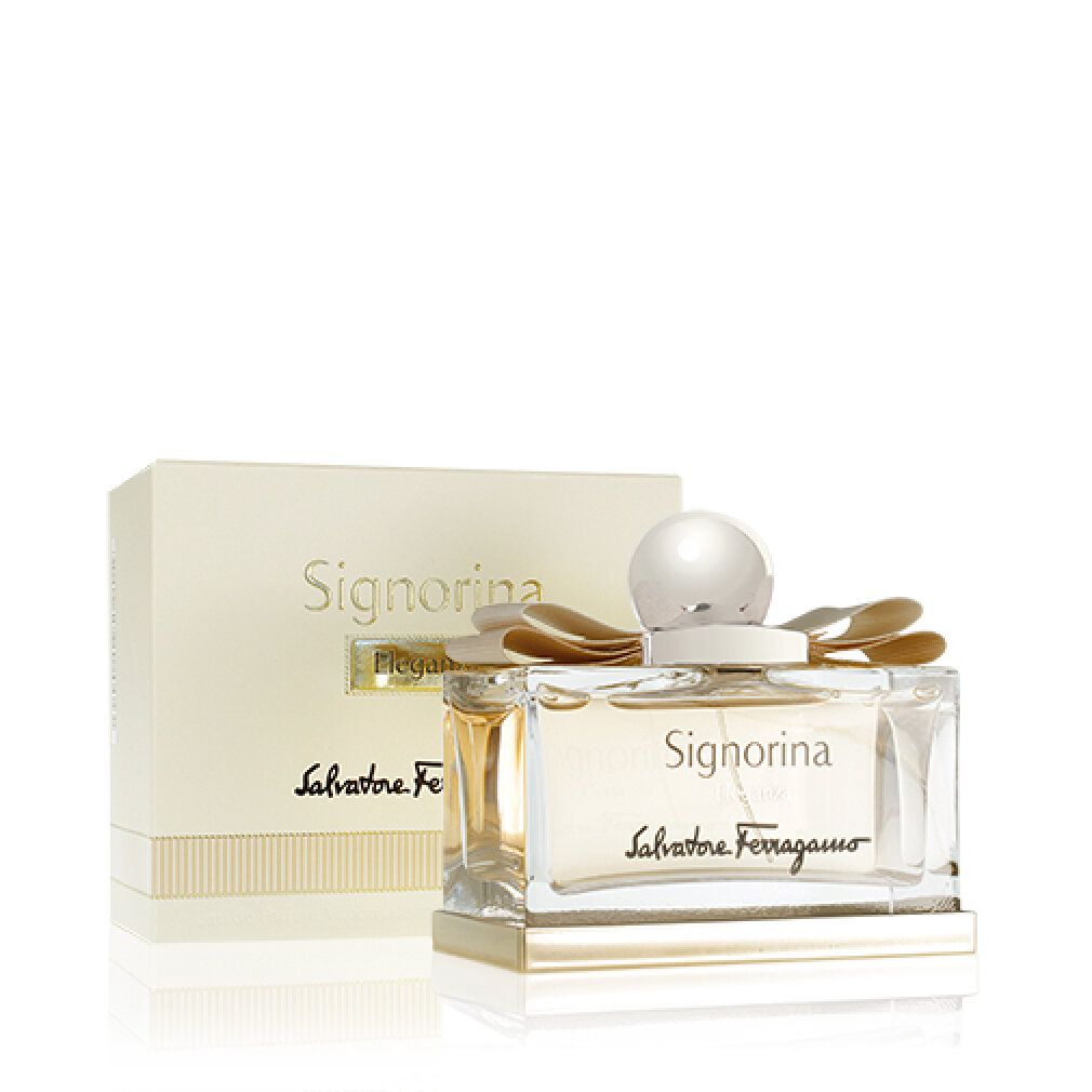 Signorina Eleganza Parfümflakon mit Verpackung. Rechteckiger Glasflakon mit goldfarbenem Verschluss und Schleife. Schriftzug Signorina Eleganza und Salvatore Ferragamo.