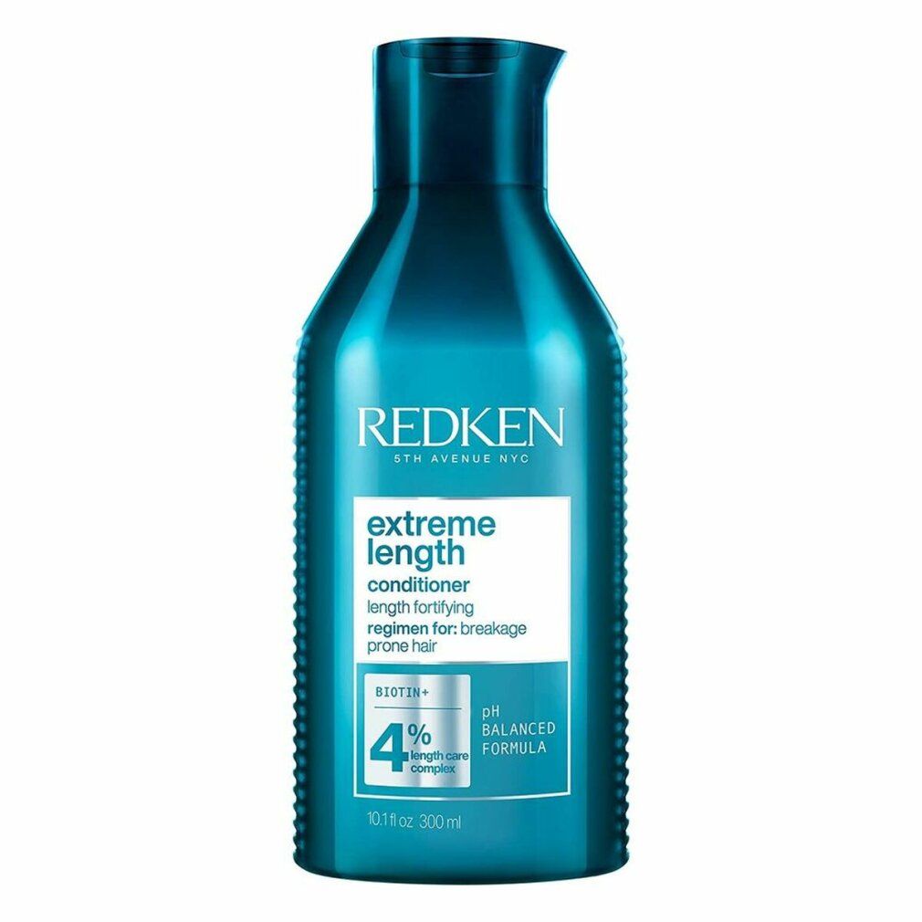Türkisgrüne Flasche Redken Extreme Length Conditioner. Aufschrift: Conditioner, 4% Length Care Complex, pH Balanced Formula.