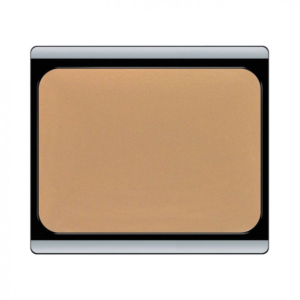 Beige Camouflage Cream in rechteckiger Dose mit schwarzem Rahmen. Deckel mit silbernem Rand.