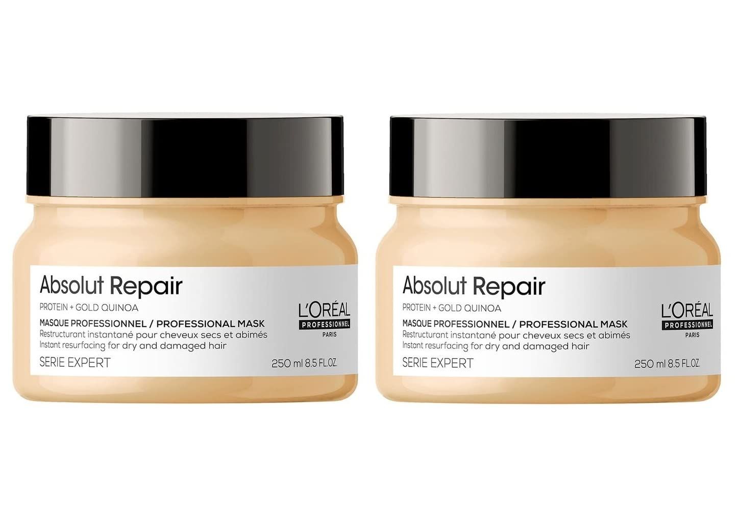 Zwei Tiegel L'Oréal Professionnel Absolut Repair Maske. Beige Tiegel mit schwarzem Deckel. Text: Absolut Repair, Serie Expert.