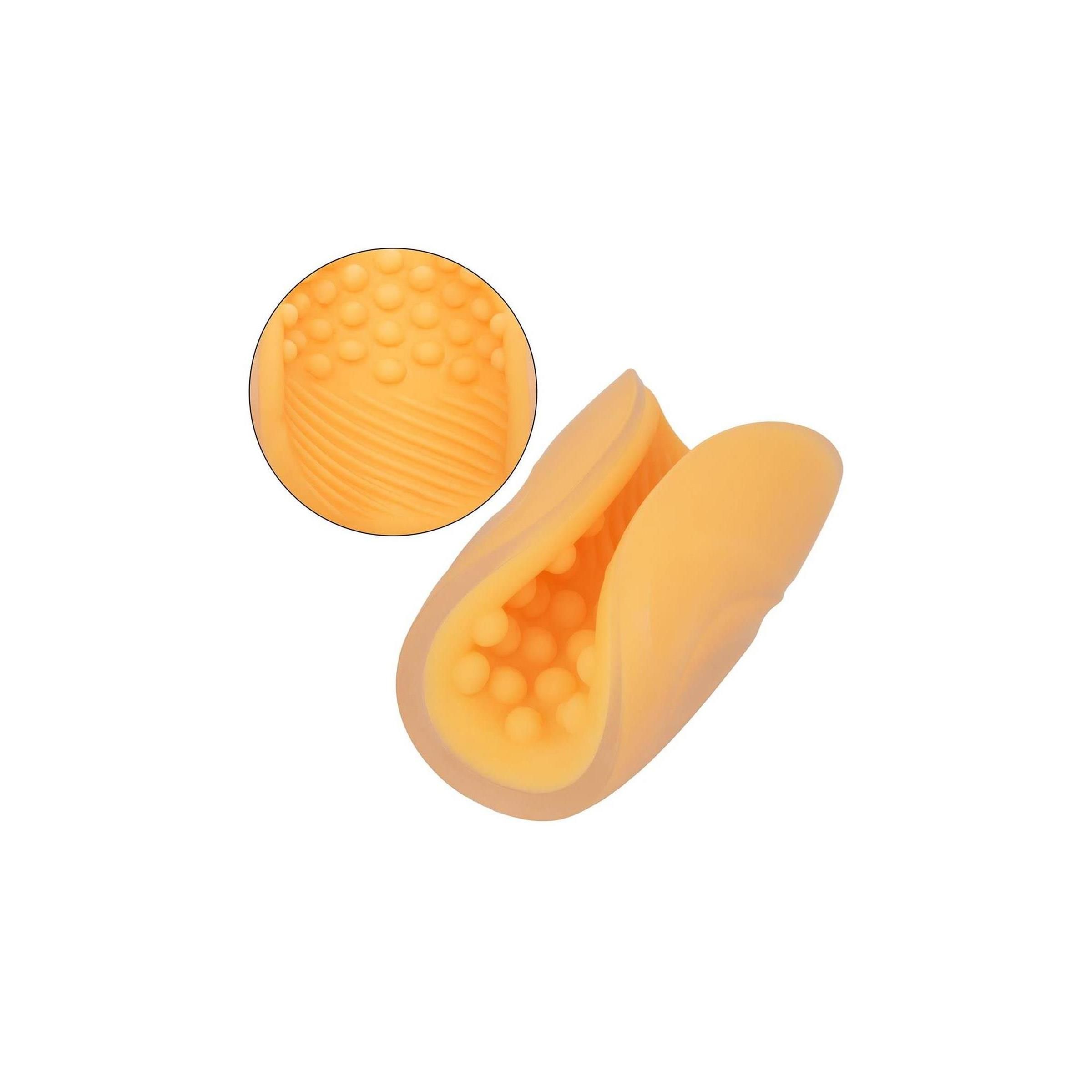 Gelbes, offenes Produkt mit genoppter und geriffelter Innenseite. Vergrößerte Detailansicht.