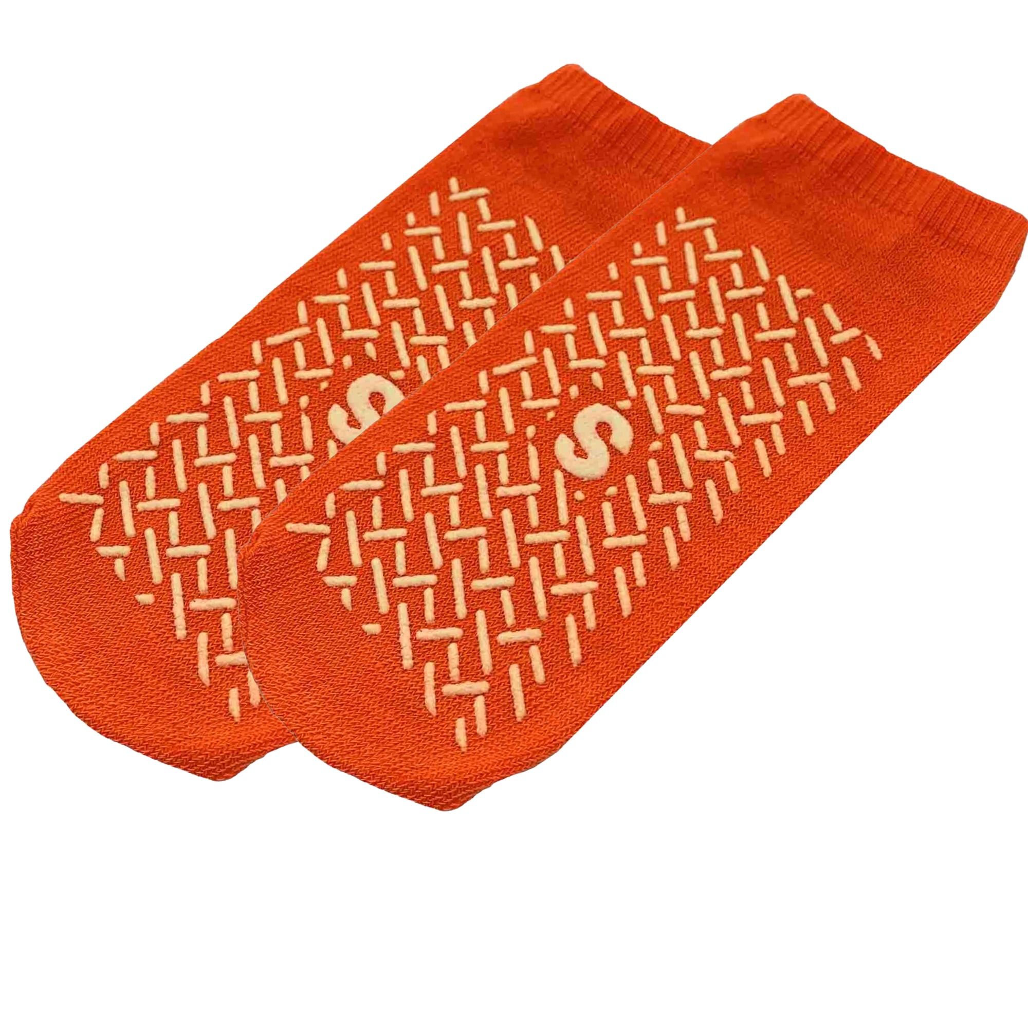 Orange Anti-Rutsch-Socken mit beidseitig beschichtetem Sohlenmuster und Größenkennzeichnung 'S'.