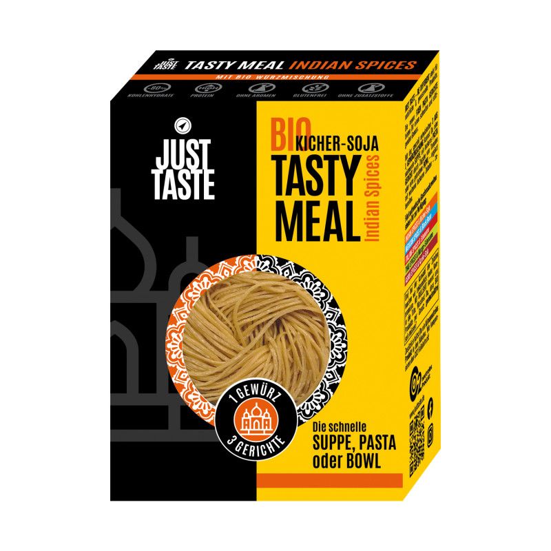 Verpackung von Just Taste Tasty Meal. Schwarzer und gelber Karton mit Produktbild und Schriftzügen: Bio Kicher-Soja, Indian Spices.