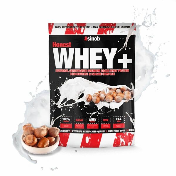 Sinob Honest Whey+ Beutel. Schwarzer Beutel mit roter und weißer Schrift. Enthält Haselnüsse und Milchspritzer.