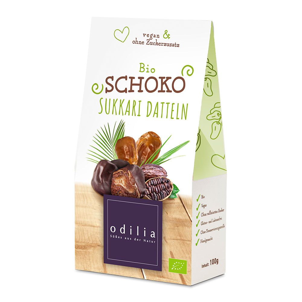 Verpackung mit Schokolierte Sukkari-Datteln Bio. Grün-weiße Verpackung mit Produktabbildung und Logo. Bio-Siegel.