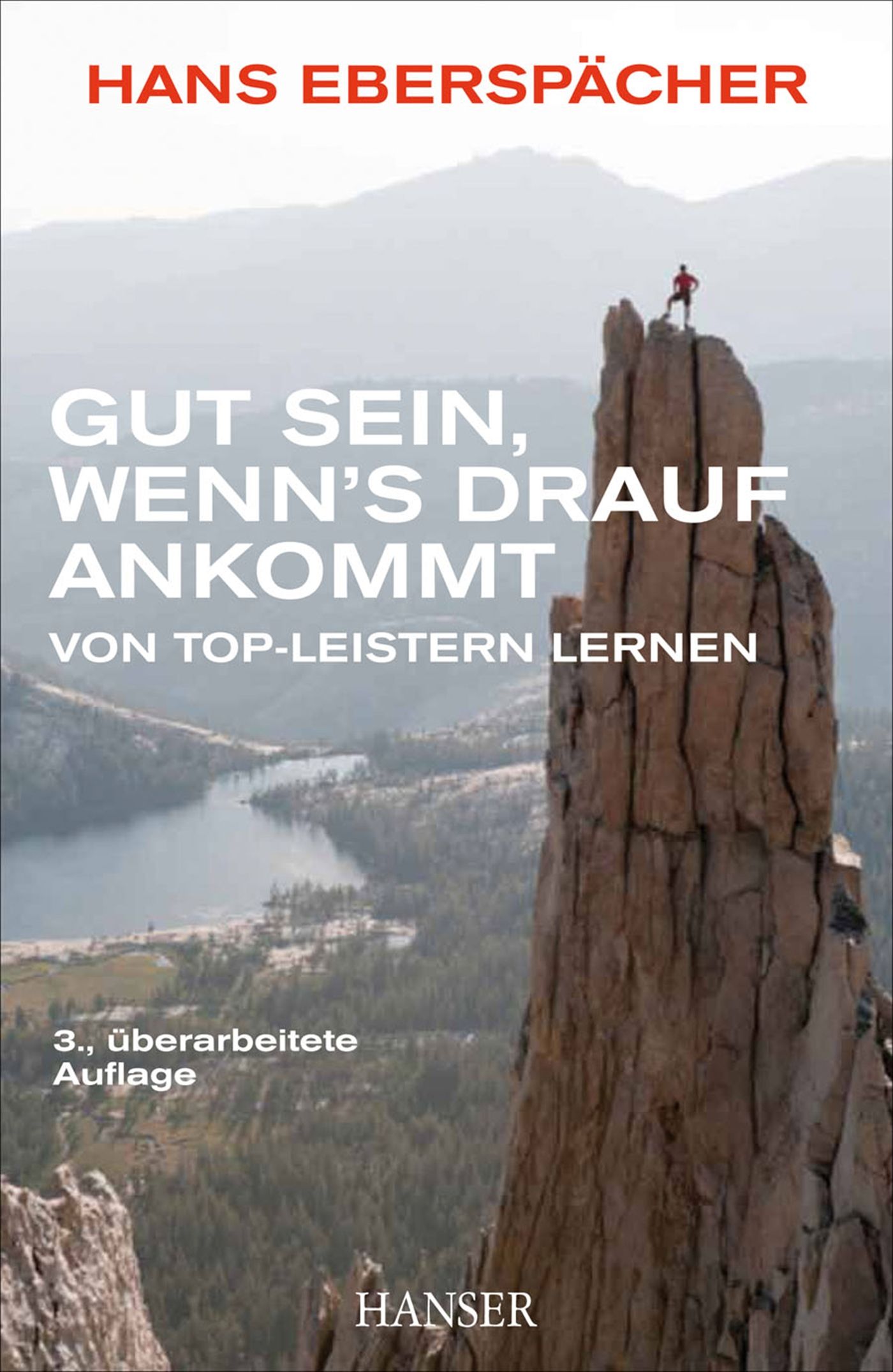 Buchcover mit Titel: Gut sein, wenn's drauf ankommt. Autor: Hans Eberspächer. Verlag: Hanser. Bergsteiger auf Felsspitze.