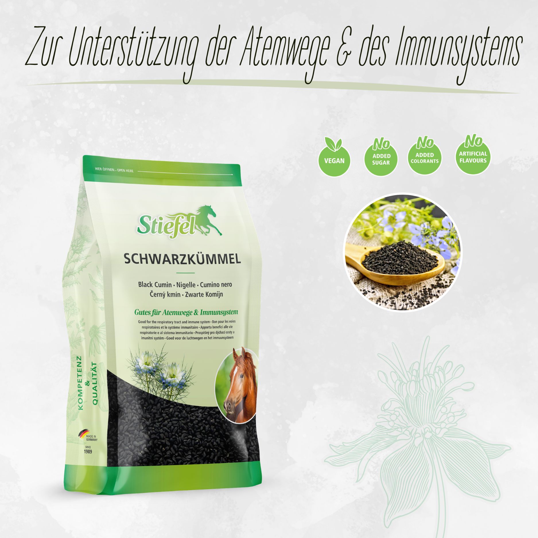 Beutel mit Schwarzkümmelsamen. Text: Vegan, kein Zuckerzusatz, keine Farbstoffe, keine künstlichen Aromen. Abbildung von Samen auf Löffel.