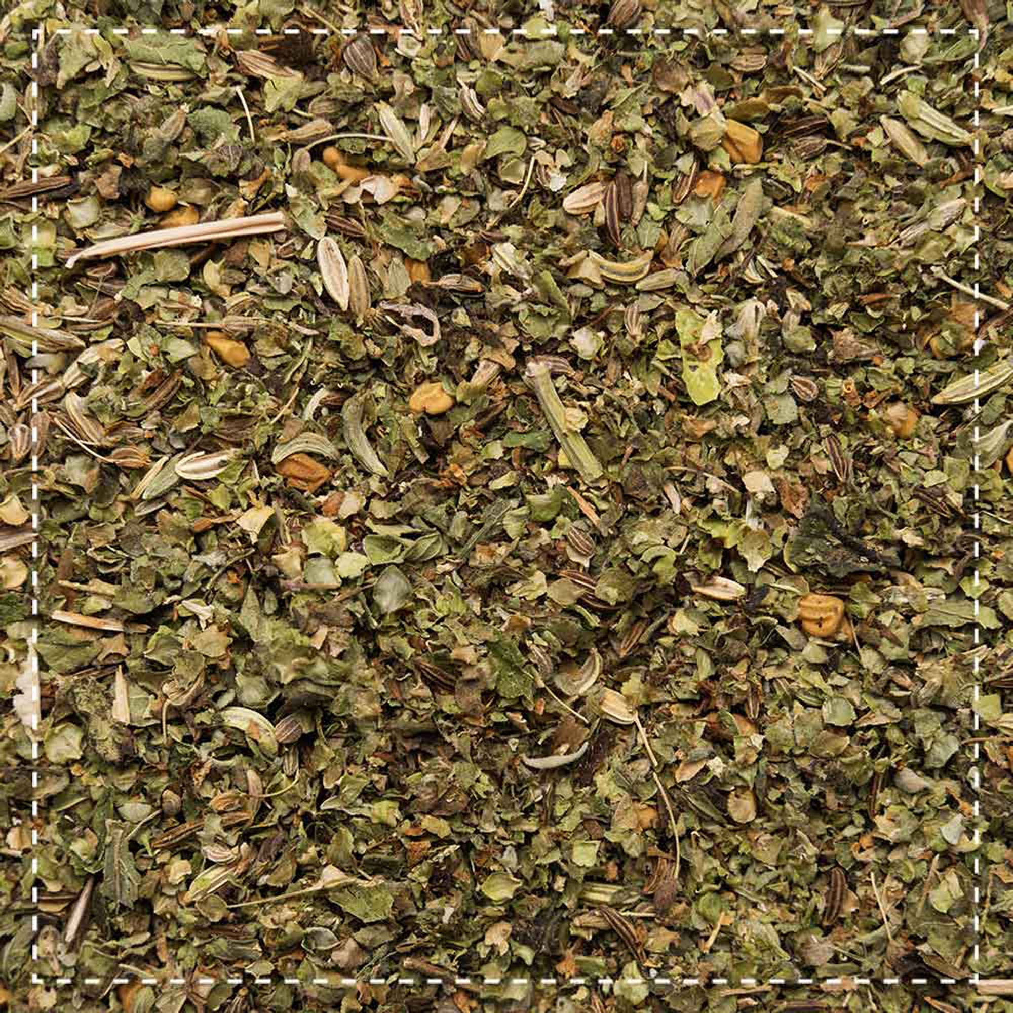 Primo piano di tè sfuso alle erbe. Erbe, semi e foglie verdi e marroni.