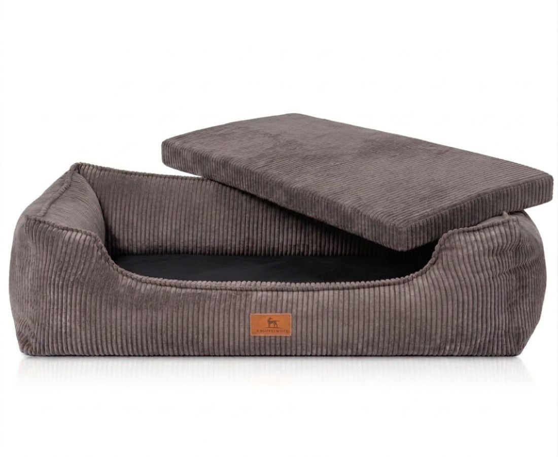 Braunes Hundebett aus Cord mit abnehmbarem Kissen.