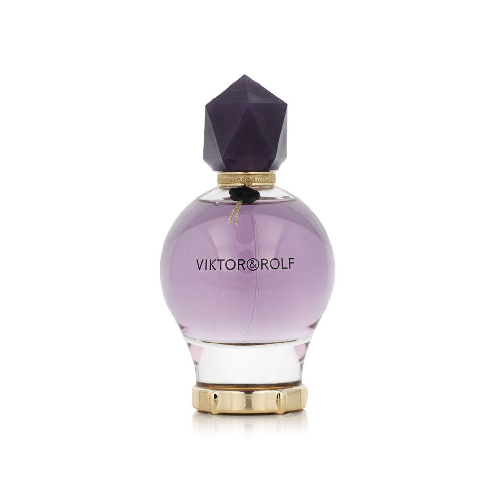 Viktor & Rolf Good Fortune Flakon. Runder, lila Flakon mit Kristallverschluss und goldenem Ring am Boden.