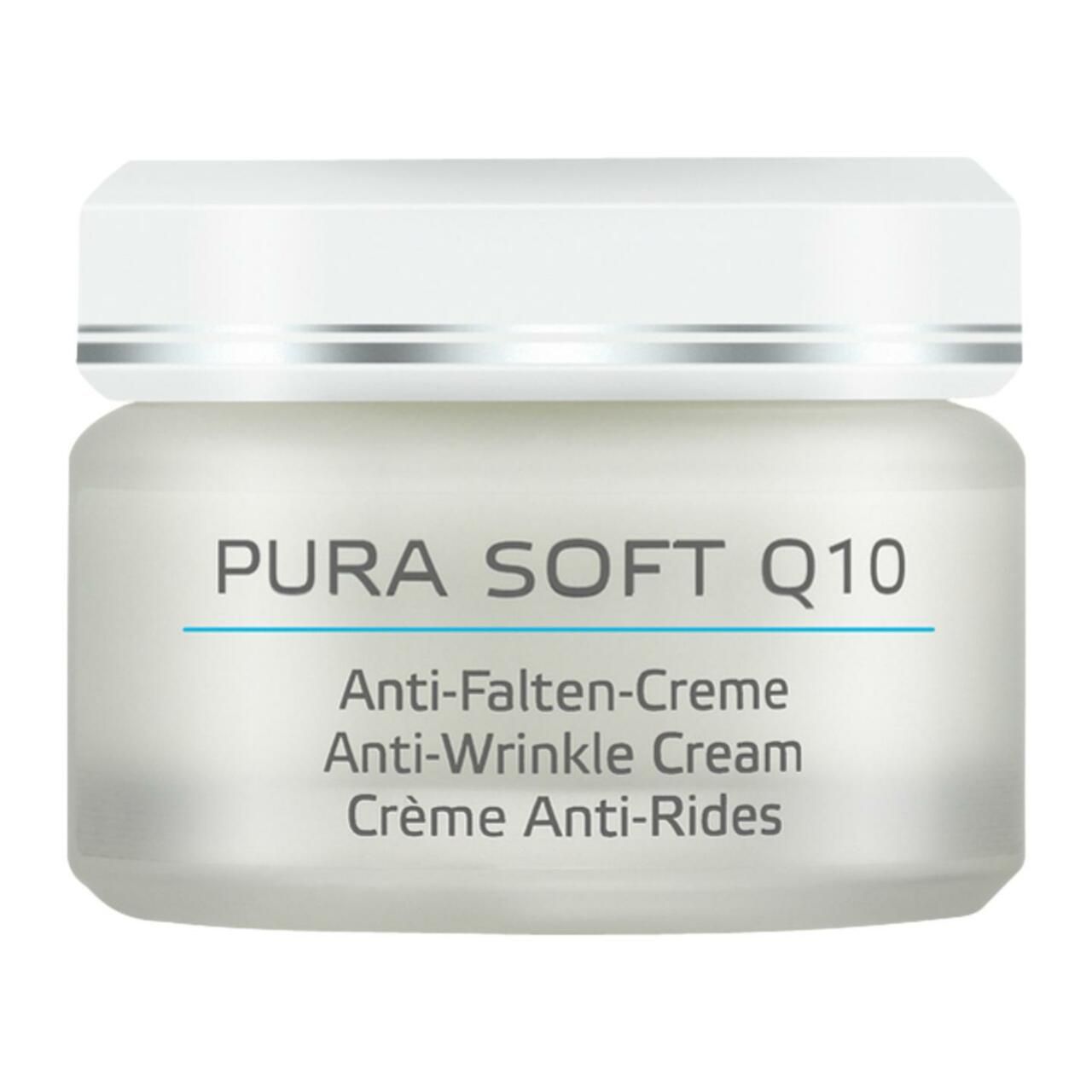 Creme-Tiegel mit weißem Deckel. Aufschrift: Pura Soft Q10, Anti-Falten-Creme. Glasbehälter.