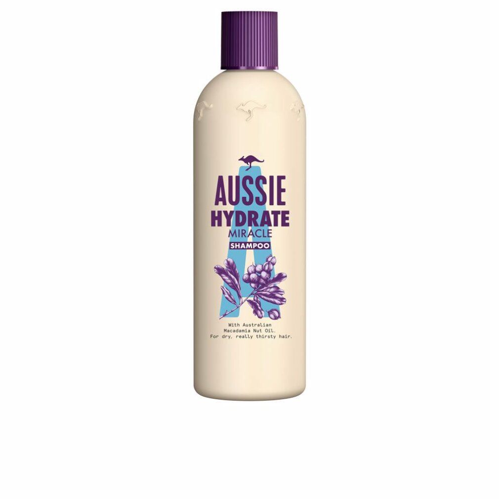 Beige Shampoo-Flasche mit lila Verschluss. Aufschrift: Aussie Hydrate Miracle Shampoo. Illustration mit Blättern und Beeren.