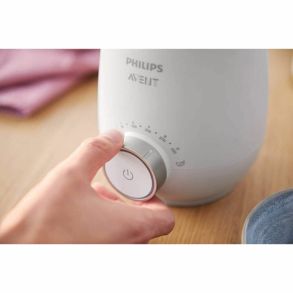 Hand dreht Drehregler eines weißen Philips Avent Flaschenwärmers. Aufdruck: Philips Avent.