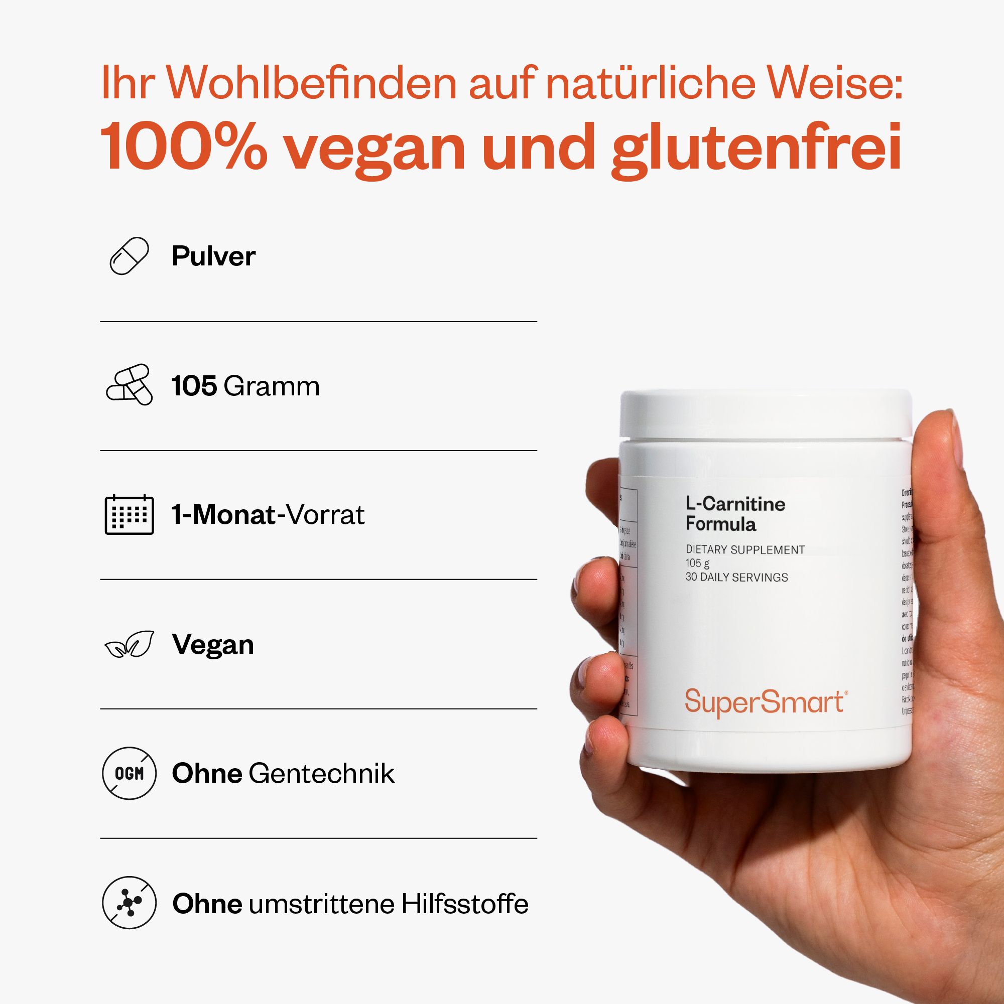 Hand hält ein weißes Produktglas. Enthält L-Carnitin-Formel, 105 g, 1-Monats-Vorrat. 100% vegan und glutenfrei.
