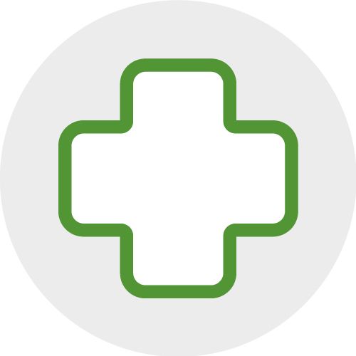 Grünes Kreuz-Symbol, steht für medizinische Versorgung.