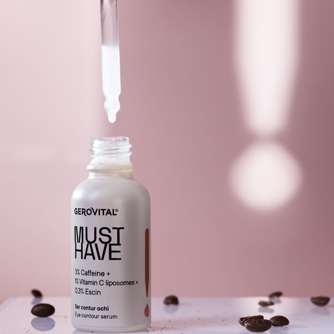 Serumflasche mit Tropfer. Aufschrift: MUST HAVE, 3% Koffein, 1% Vitamin C, 0,3% Escin. Tropfen.