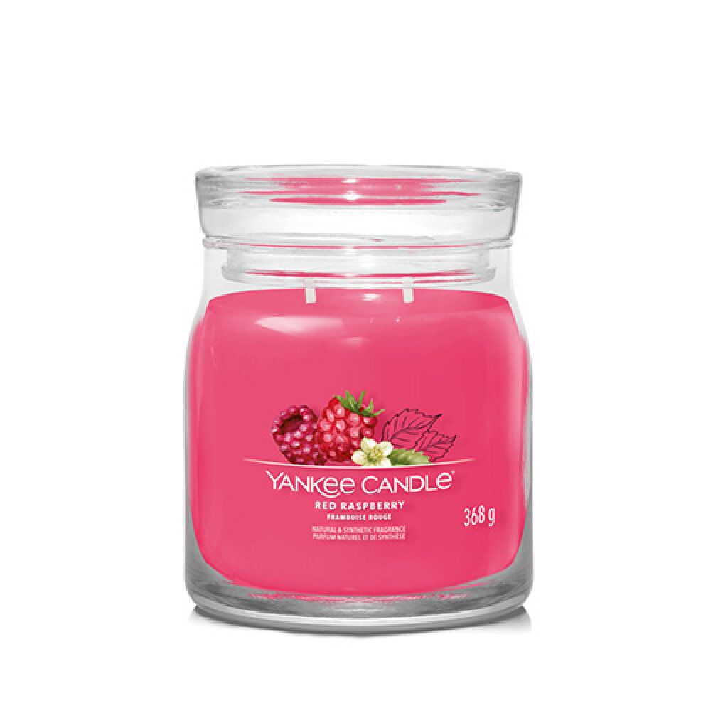 Rote Kerze im Glas. Aufkleber mit Himbeeren und Blättern. Text: Red Raspberry, 368g, Yankee Candle.