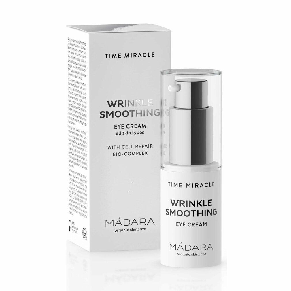 Madara Time Miracle Augencreme und Verpackung. Weißes Produkt mit silbernem Spender. Text: Time Miracle, Wrinkle Smoothing, Eye Cream.
