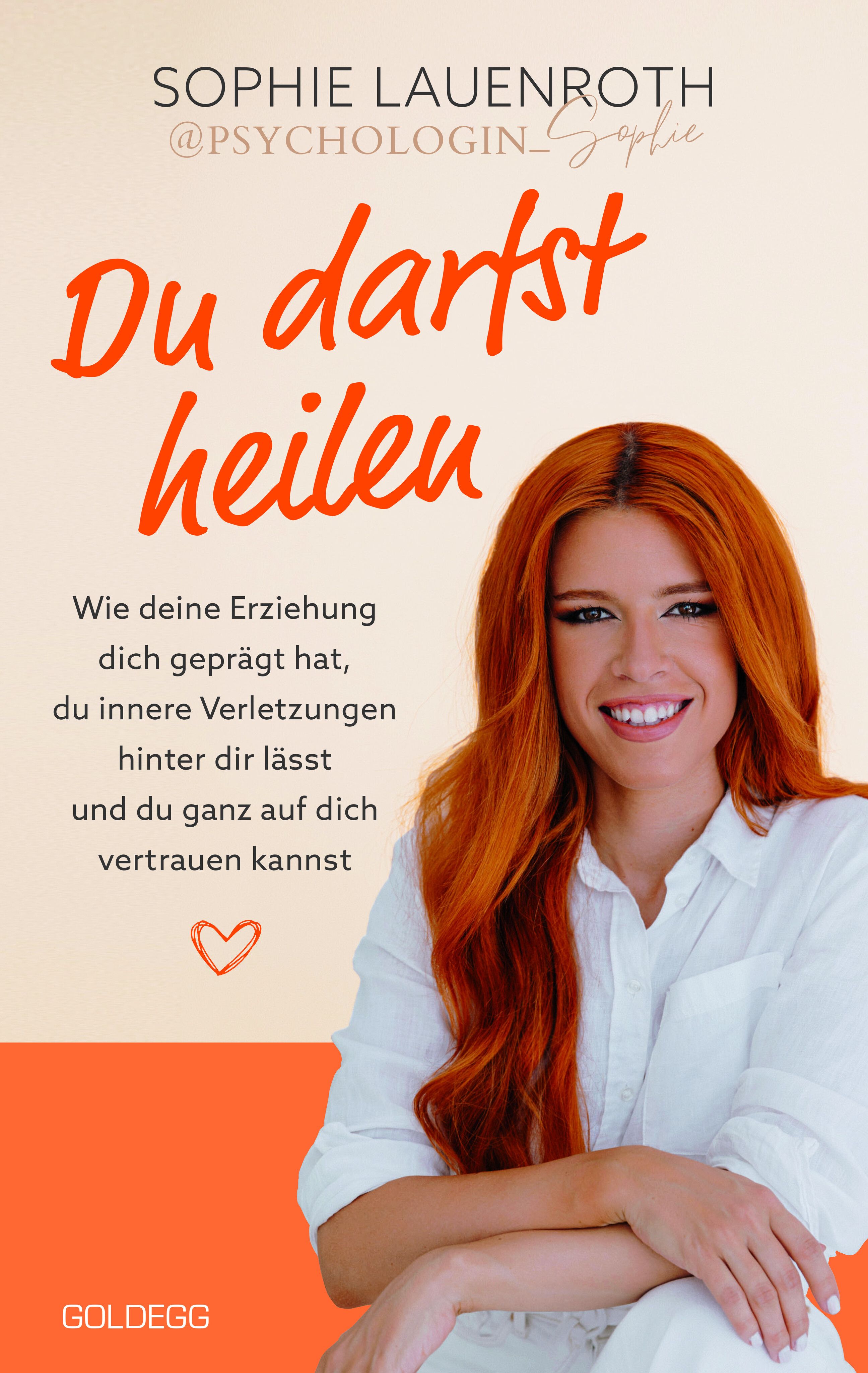 Buchcover mit Titel "Du darfst heilen". Frau mit roten Haaren, weißem Hemd. Text über Erziehung und Vertrauen. Verlag: Goldegg.
