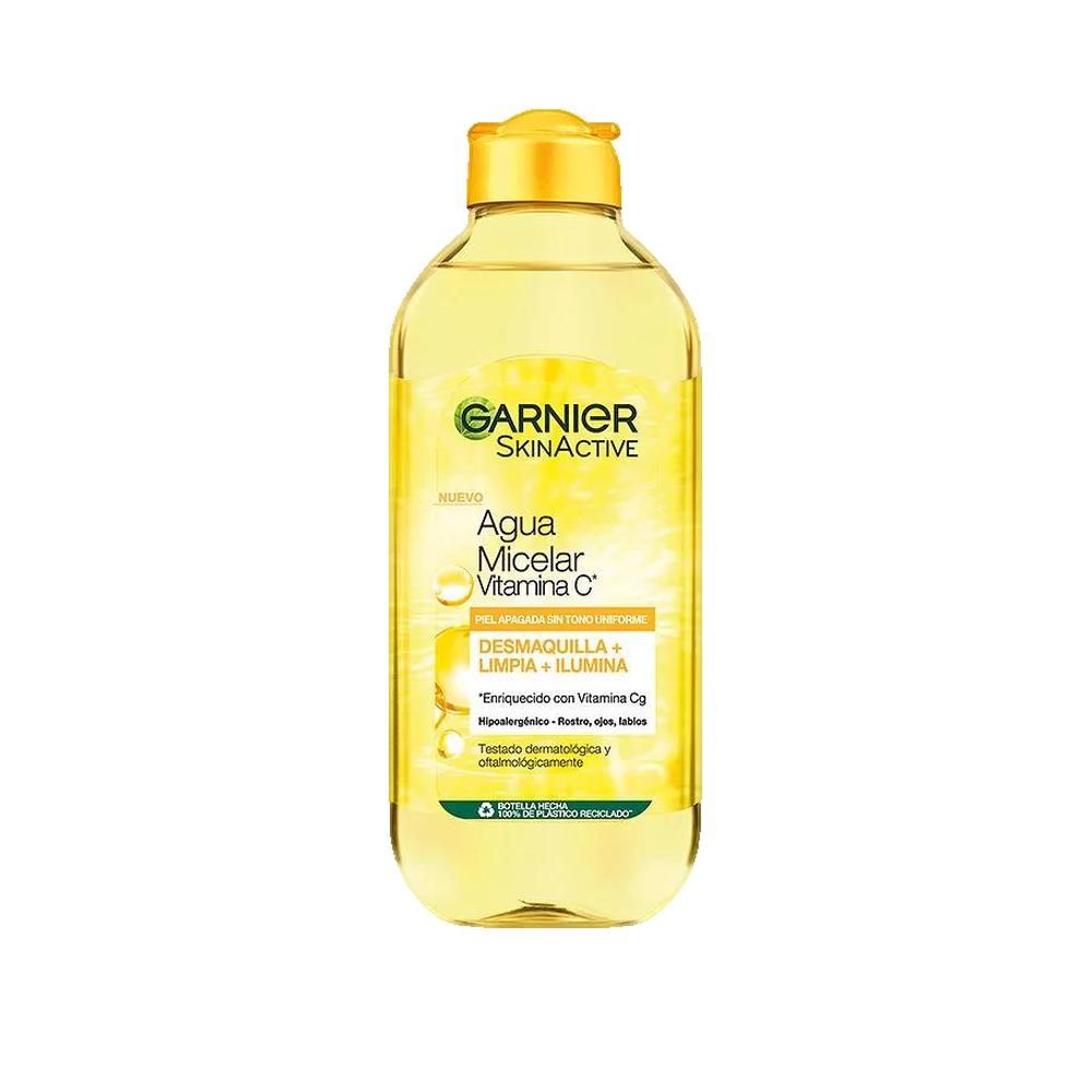 Gelbe Flasche mit gelber Flüssigkeit und gelbem Deckel. Aufschrift: Garnier Skinactive Agua Micelar Vitamina C.