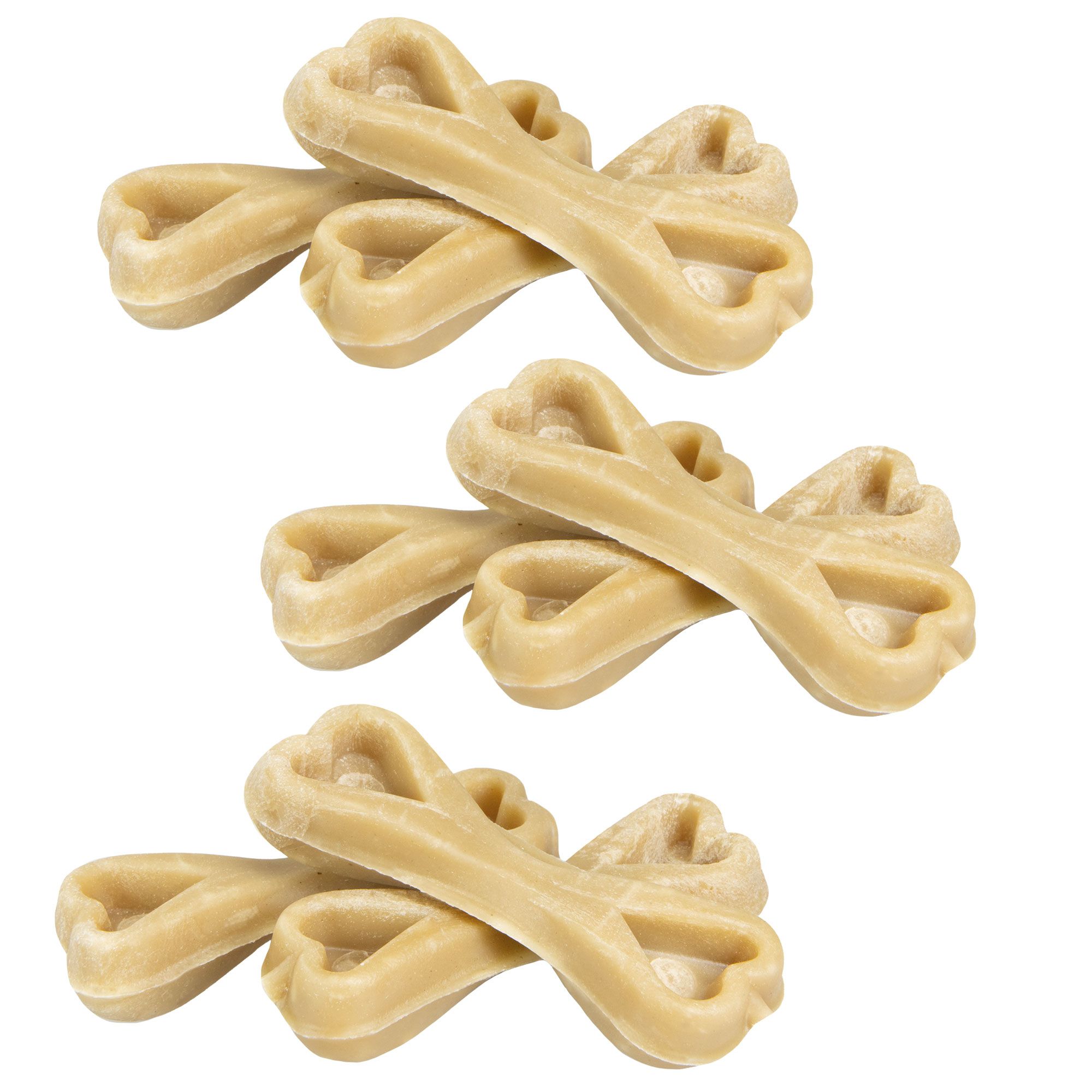 Mehrere beige Knochen in Herzform. Auf weißem Hintergrund. Die Knochen sind gestapelt.
