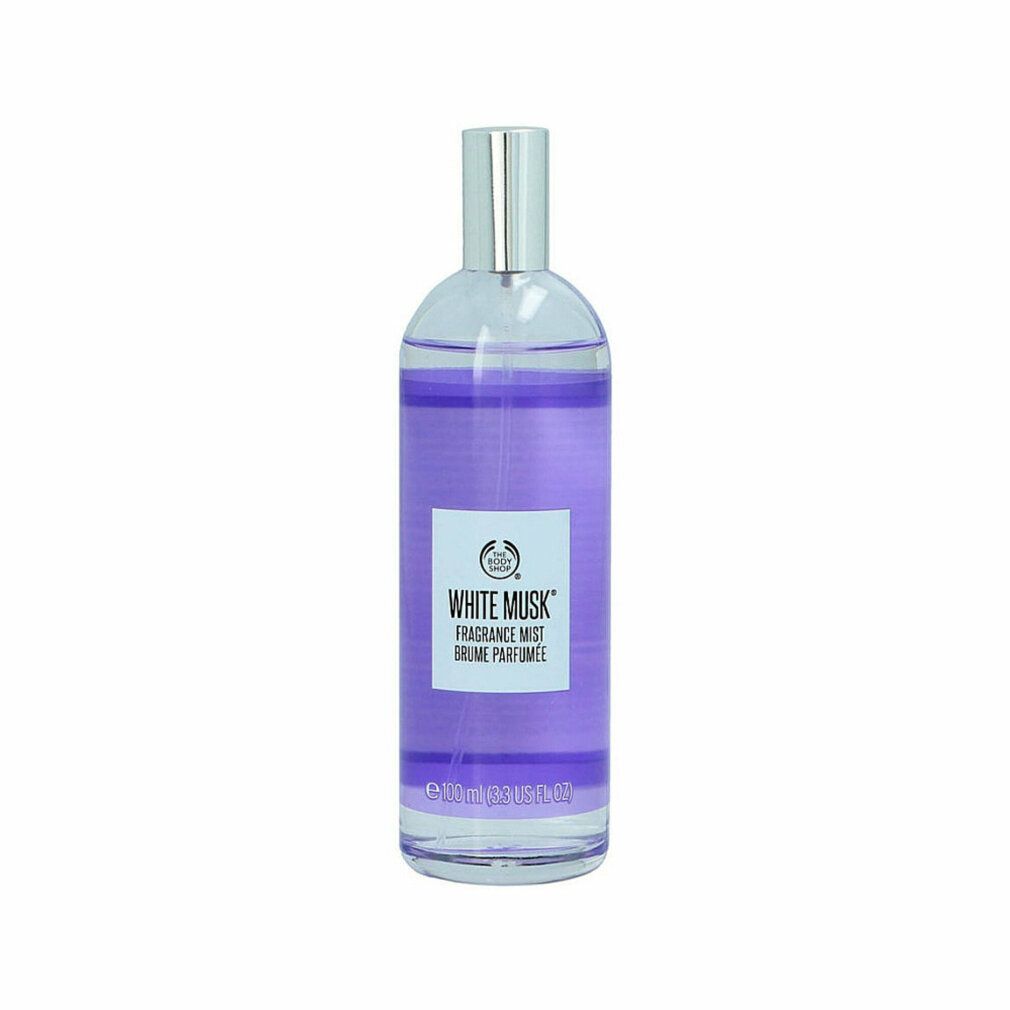 Glasflasche mit lila Flüssigkeit. Silberner Sprühkopf. Etikett mit Logo und Text: White Musk, Fragrance Mist, Brume Parfumée.