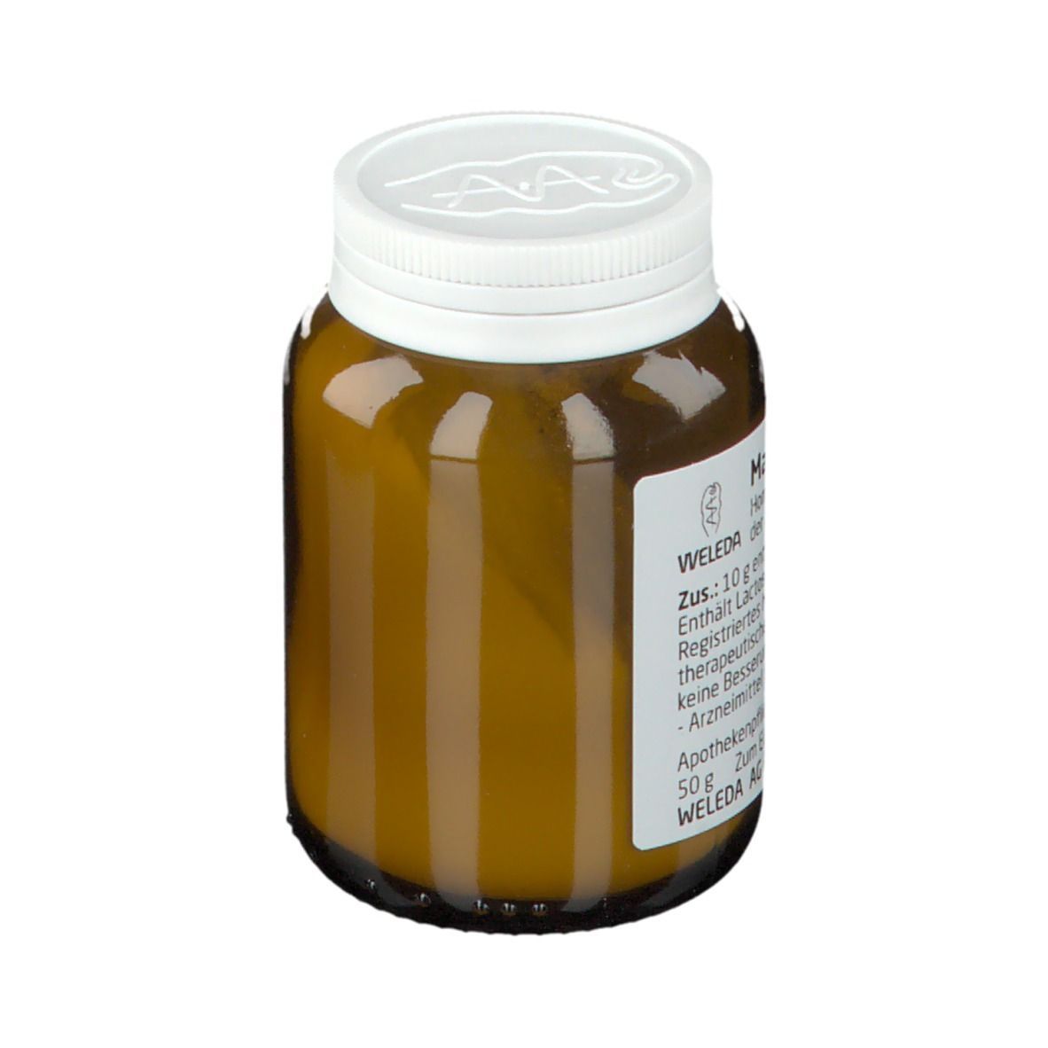 Braune Glasflasche mit weißem Deckel. Etikett mit Text: Magnesit D6 Verreibung, WELEDA. Apothekenpflichtig.