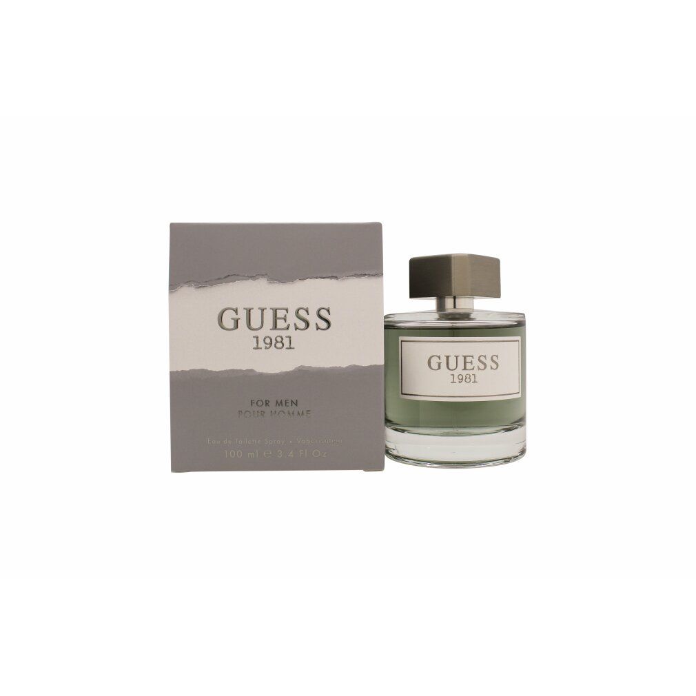 Flakon und Schachtel. Aufschrift: GUESS 1981 FOR MEN. Eckiger Flakon mit silbernem Verschluss. Graue Schachtel mit weißem Streifen.