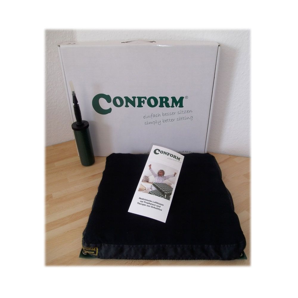Schwarzes Luftkissen mit Pumpe und Kartonverpackung. Marke CONFORM.