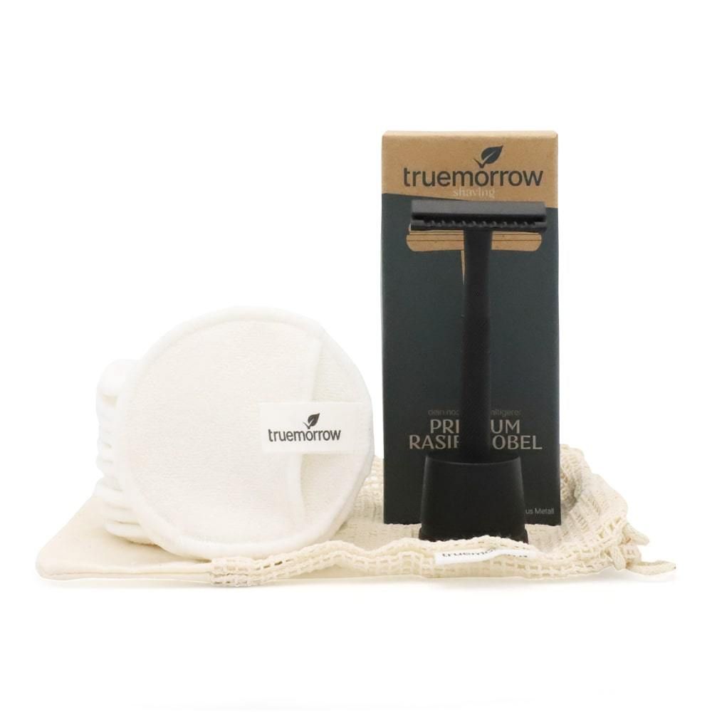 Schwarzes Rasierhobel-Set mit Wattepads und Beutel. Marke: truemorrow. Verpackung mit Produktnamen.