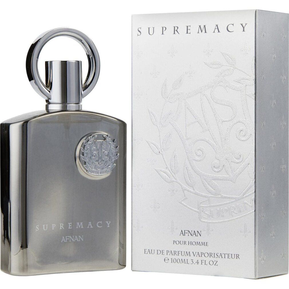 Silberne Parfumflasche und Verpackung. Flasche mit rundem Verschluss. Aufschrift: SUPREMACY, AFNAN, Eau de Parfum Vaporisateur. Geprägtes Logo.