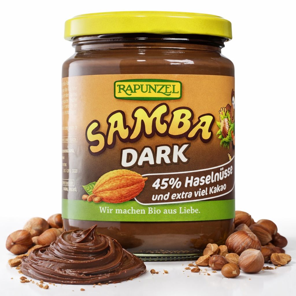 Rapunzel Samba Dark Schoko-Nuss-Aufstrich im Glas mit gelbem Deckel, Haselnüssen und Kakao abgebildet.